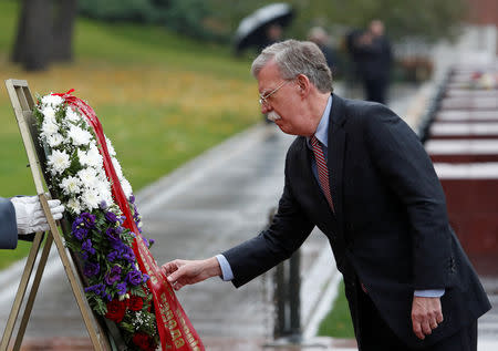 U.S. National Security Adviser John Bolton attends a wreath-laying ceremony at the Tomb of the Unknown Soldier by the Kremlin wall in Moscow, Russia October 23, 2018. REUTERS/Sergei Karpukhin