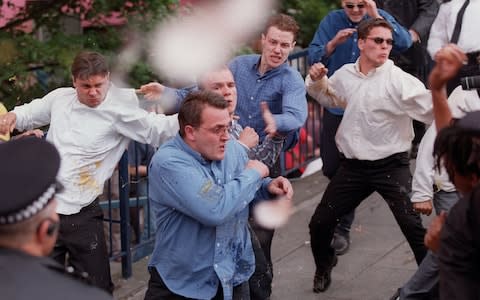 Luke Knight, David Norris, Neil Acourt and Jamie Acourt pelted by a crowd after giving evidence to inquiry into the murder - Credit: Reuters