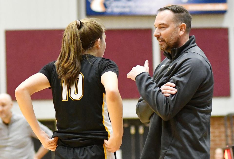 Quaker Valley coach Ken Johns talks to his daughter, Nora Johns during the Thursday, Jan. 5 game at Beaver Area High School.