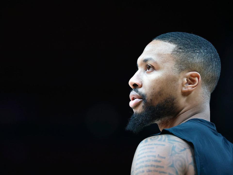 Damian Lillard looks up during  warm-ups.