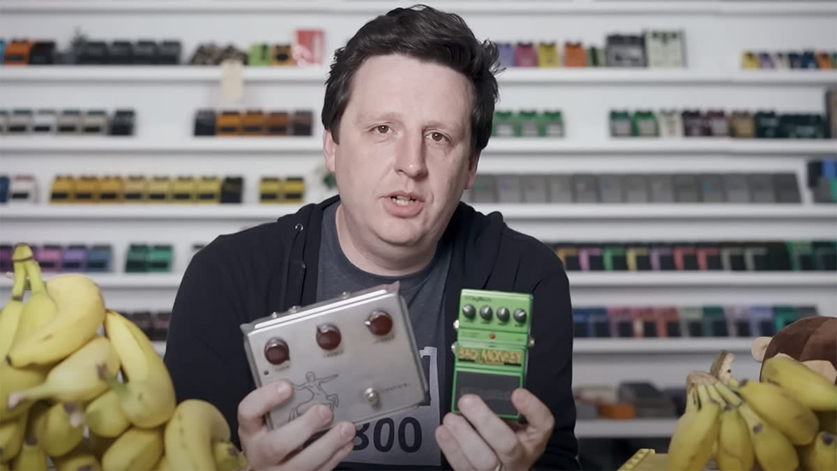  Josh Scott holding a Klon Centaur and DigiTech Bad Monkey 