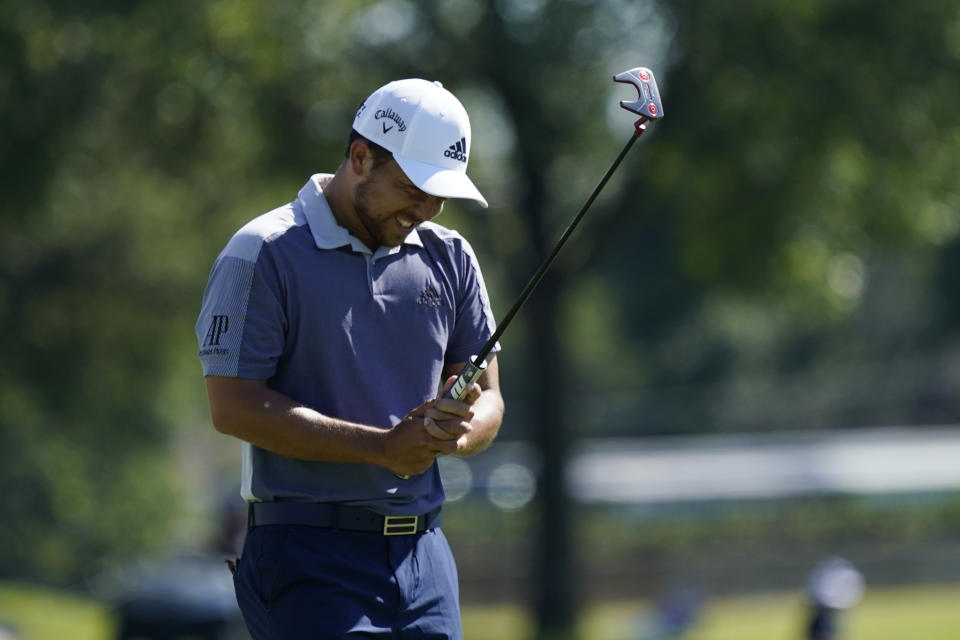 Xander Schauffele reacts after missing a birdie putt on the 18th green during the final round of the Charles Schwab Challenge golf tournament at the Colonial Country Club in Fort Worth, Texas, Sunday, June 14, 2020. (AP Photo/David J. Phillip)