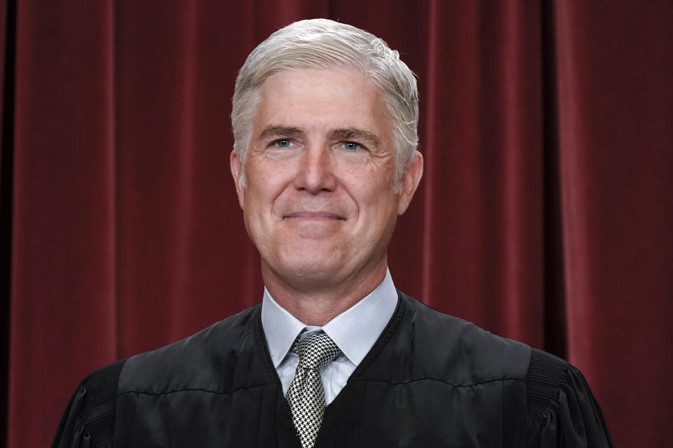 FILE - Supreme Court Justice Neil Gorsuch poses for a new group portrait, at the Supreme Court building in Washington, Friday, Oct. 7, 2022. (AP Photo/J. Scott Applewhite, File)