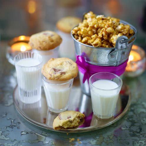 <p>Chewy and certainly chocolatey, these nostalgic canapés are sure to bring a smile to your guests’ faces</p><p><strong>Recipe: <a href="https://www.goodhousekeeping.com/uk/food/recipes/a535102/cookies-and-milk/" rel="nofollow noopener" target="_blank" data-ylk="slk:Cookies and Milk;elm:context_link;itc:0;sec:content-canvas" class="link ">Cookies and Milk</a></strong></p>