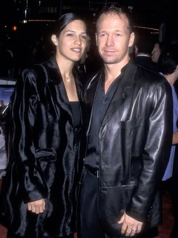 <p>Ron Galella, Ltd./Ron Galella Collection/Getty</p> Donnie Wahlberg and Kimberly Fey attend the 'Three Kings' Westwood premiere on September 27, 1999.