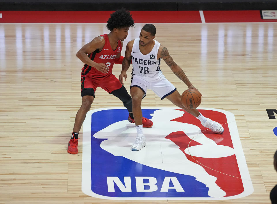 Atlanta Hawks guard Sharife Cooper defends against Indiana Pacers guard Keifer Sykes during the 2021 NBA Summer League at Cox Pavilion in Las Vegas on Aug. 10, 2021. (Stephen R. Sylvanie/USA TODAY Sports)