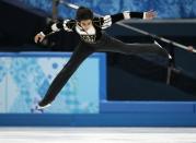 Michael Christian Martinez of the Philippines competes in the men's short program figure skating competition at the Iceberg Skating Palace during the 2014 Winter Olympics, Thursday, Feb. 13, 2014, in Sochi, Russia. (AP Photo/Ivan Sekretarev)