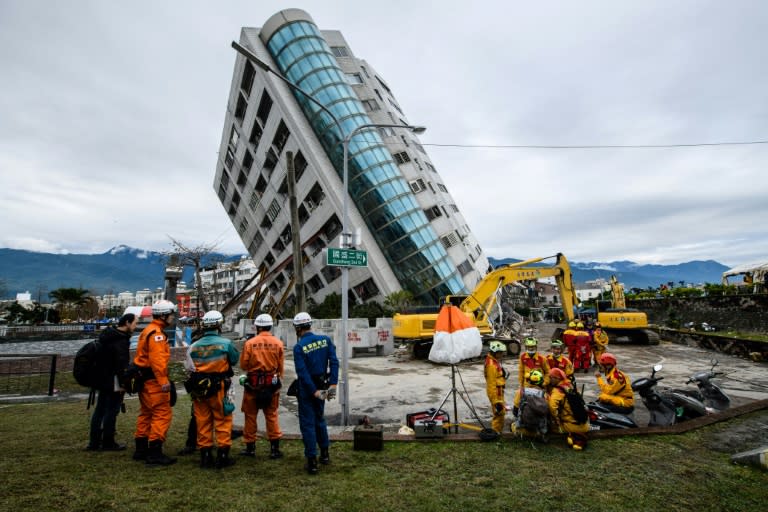 Nine of the 12 people killed in the quake perished in the Yun Tsui building, which was left leaning precariously