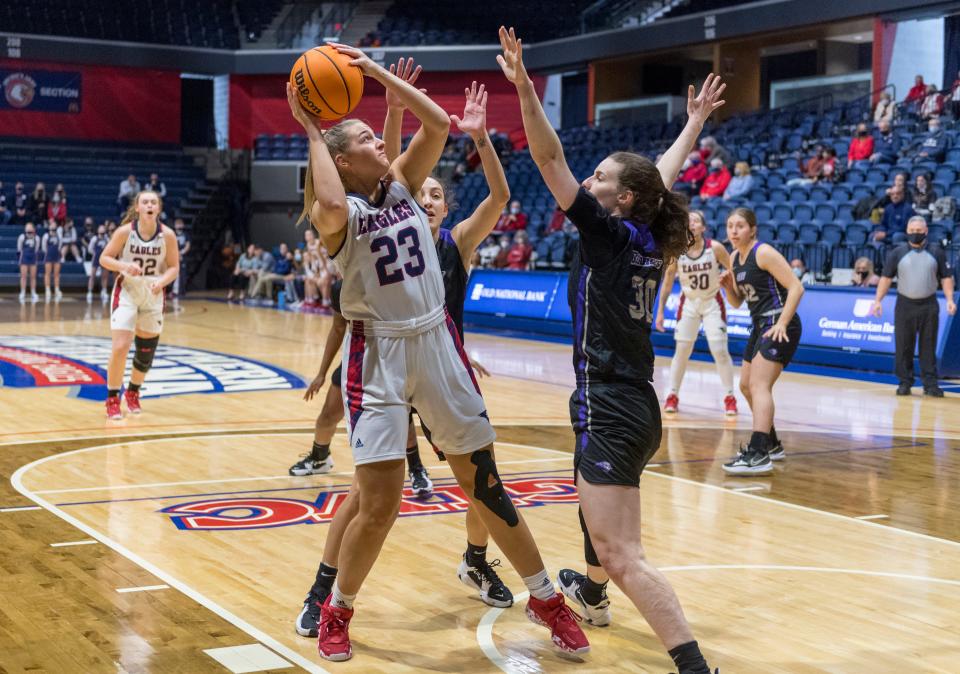 Southern Indiana’s Ashlynn Brown (23) takes a shot as the University of Southern Indiana Screaming Eagles play the Southwest Baptist University Bearcats at Screaming Eagles Arena in Evansville, Ind., Saturday afternoon, Jan. 8, 2022. 