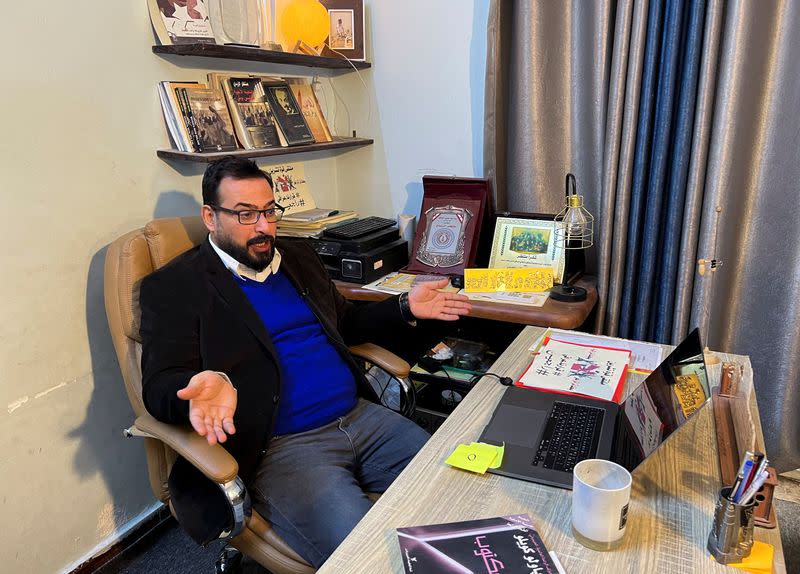 Iraqi journalist Muntadhar al-Zaidi, who gained fame for hurling his shoes at President George W. Bush, sits at his home in Baghdad