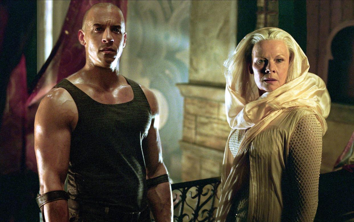 Vin Diesel with Judi Dench in The Chronicles of Riddick