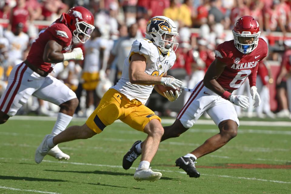 Kent State running back Gavin Garcia, running the ball earlier this season at Arkansas, gained 29 of his team's 97 total yards Saturday.