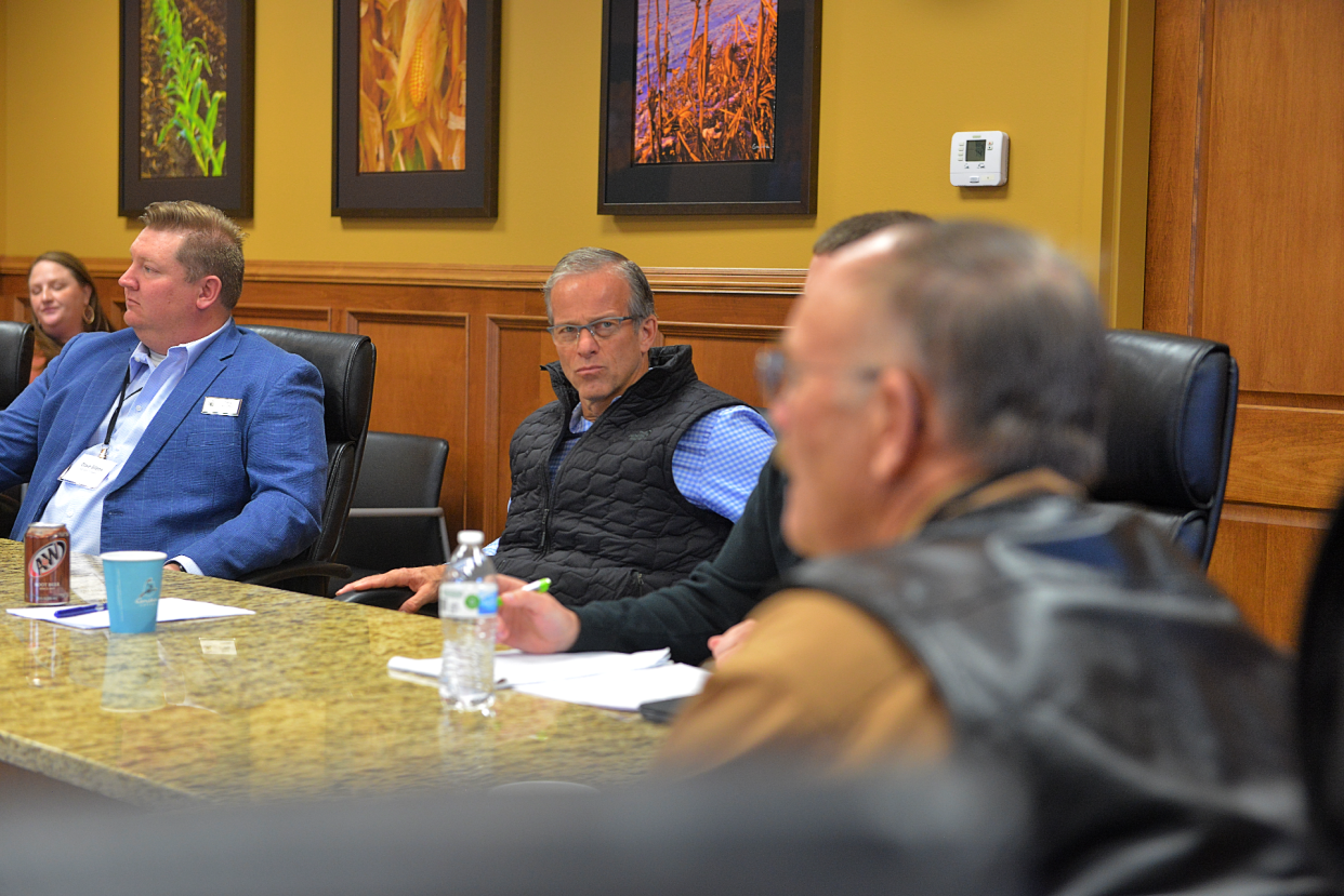 Sen. John Thune, center, listens to South Dakota Wheat Growers Association vice president Doug Simons talk during a 2023 Farm Bill roundtable on Jan. 10, 2023.