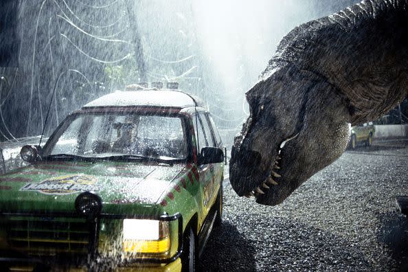 A tyrannosaurus rex terrorizes people trapped in a car in a scene from the 1993 American film Jurassic Park directed by Steven Spielberg. The sci-fi adventure stars Sam Neill, Laura Dern, and Jeff Goldblum. The film is an adaptation of Michael Crichton's novel of the same name. (Photo by Murray Close/Sygma/Sygma via Getty Images) (Photo: Murray Close via Sygma via Getty Images)