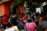 Women wait for food donations after an earthquake that struck on the southern coast of Mexico late on Thursday, in Juchitan, Mexico, September 10, 2017. Picture taken, September 10, 2017. REUTERS/Edgard Garrido