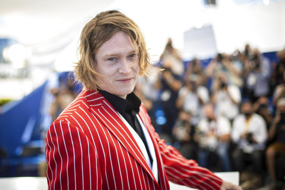 Caleb Landry Jones poses for photographers at the photo call for the film 'Nitram' at the 74th international film festival, Cannes, southern France, Saturday, July 17, 2021. (Photo by Vianney Le Caer/Invision/AP)