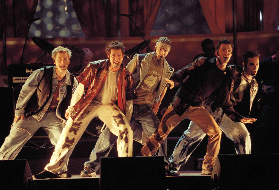 FILE - Members of NSync, from left, Lance Bass, Joey Fatone, Justin Timberlake, JC Chasez and Chris Kirkpartrick perform at the 9th annual MTV Movie Awards in Culver City, Calif., on June 3, 2000. (AP Photo/Chris Pizzello, File)