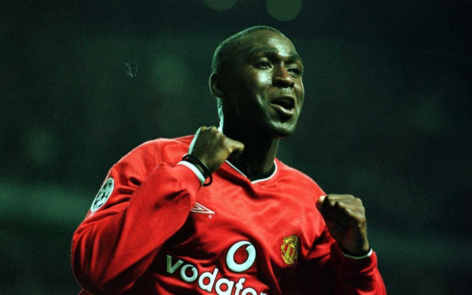 Andy Cole of Man Utd celebrates his hat-trick and the fifth goal during the Manchester United v RSC Anderlecht UEFA Champions League - Credit: Getty Images