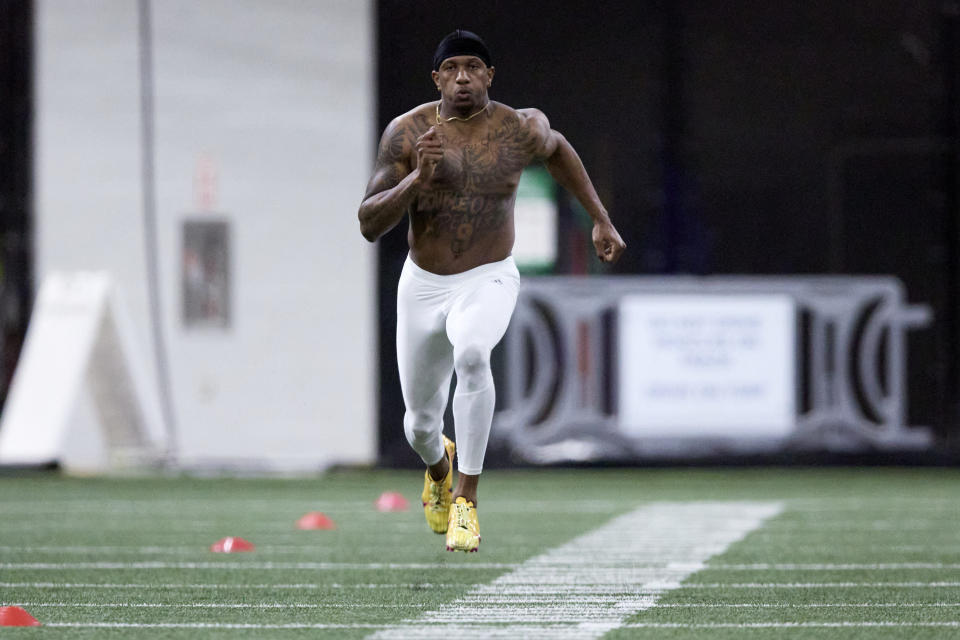 Washington quarterback Michael Penix Jr. sprints during Washington's NFL Pro Day, Thursday, March 28, 2024, in Seattle. (AP Photo/John Froschauer)