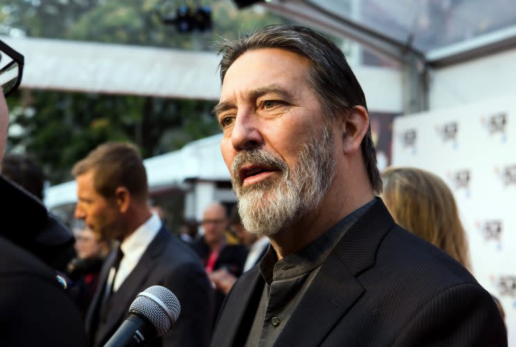 Actor Ciaran Hinds talks to interviewers on arrival at the premiere of the film ‘Bleed For This’, showing as part of the London Film Festival in London, Sunday, Oct. 9, 2016. (Photo by Grant Pollard/Invision/AP)