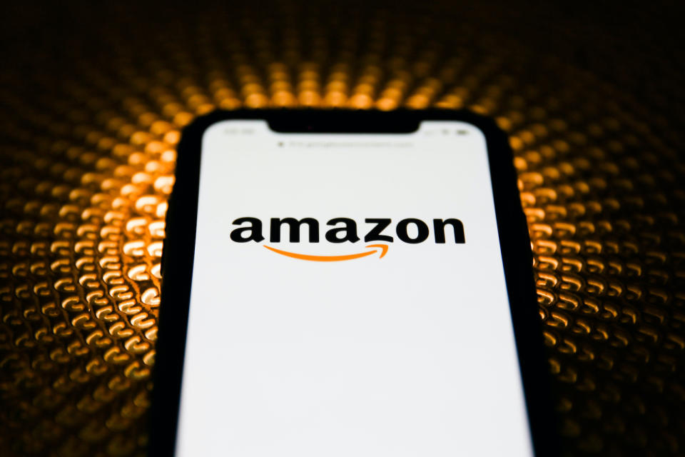 Amazon logo is seen displayed on phone screen in this illustration photo taken in Poland on February 20, 2020. (Photo illustration byJakub Porzycki/NurPhoto)