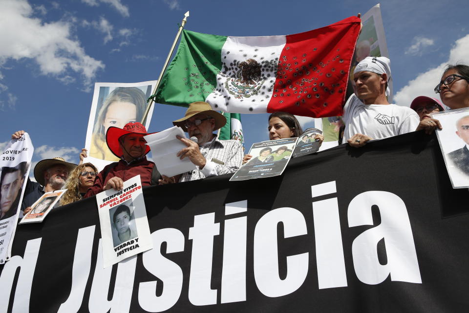 Poet and activist Javier Sicilia speaks after a march against violence called "Walk for Peace," in Mexico City, Sunday, Jan. 26, 2020. Sicilia, accompanied by more than a hundred members of the LeBaron family, led his second march against violence in Mexico, with the group gathering supporters as it made its way towards Mexico City's main square the Zocalo. (AP Photo/Ginnette Riquelme)