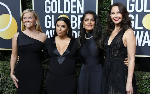 Reese Witherspoon, Eva Longoria, Salma Hayek and Ashley Judd arrive at the Golden Globes - Credit: Wireimage
