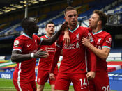 LIVERPOOL, ENGLAND - OCTOBER 17: (THE SUN OUT, THE SUN ON SUNDAY OUT ) Jordan Henderson captain of Liverpool Celebrates after scoring the third goal for Liverpool But then V.A.R. Cancelled his goal during the Premier League match between Everton and Liverpool at Goodison Park on October 17, 2020 in Liverpool, England. Sporting stadiums around the UK remain under strict restrictions due to the Coronavirus Pandemic as Government social distancing laws prohibit fans inside venues resulting in games being played behind closed doors. (Photo by Andrew Powell/Liverpool FC via Getty Images)