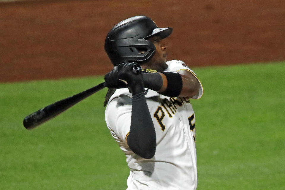Pittsburgh Pirates' Josh Bell watches his two-run double off Cleveland Indians starting pitcher Carlos Carrasco during the fifth inning of a baseball game in Pittsburgh, Tuesday, Aug. 18, 2020. (AP Photo/Gene J. Puskar)