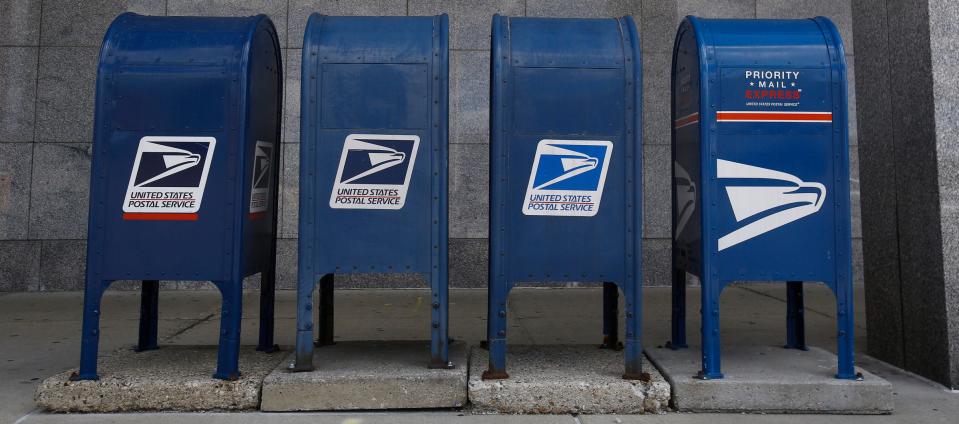 USPS mailboxes in-front of the George W. Young Post Office on Aug. 18, 2020.