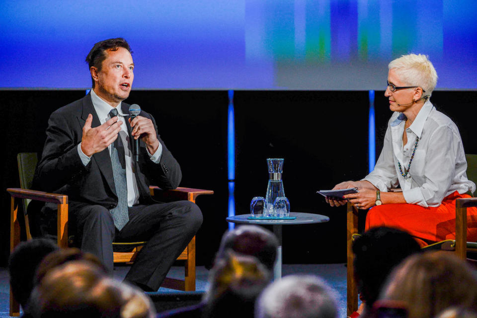 Tesla founder Elon Musk speaks with moderator Xenia Wicket during the opening of Offshore Northern Seas 2022 in Stavanger, Norway August 29, 2022. NTB/Carina Johansen via REUTERS   ATTENTION EDITORS - THIS IMAGE WAS PROVIDED BY A THIRD PARTY. NORWAY OUT. NO COMMERCIAL OR EDITORIAL SALES IN NORWAY.
