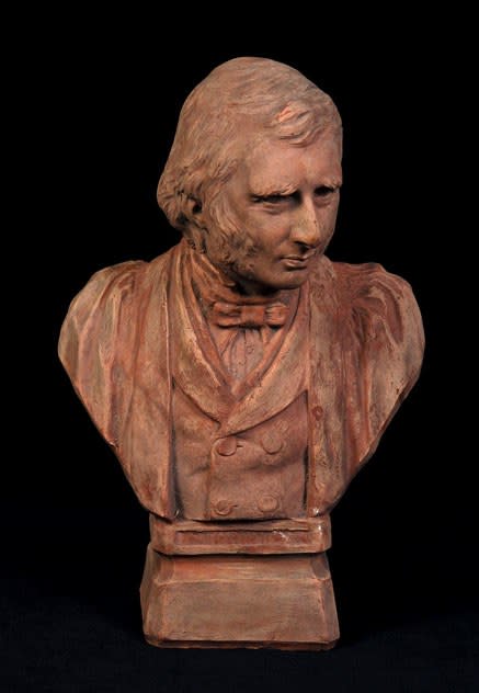 A terra-cotta bust of Ruskin by Benjamin Creswick.