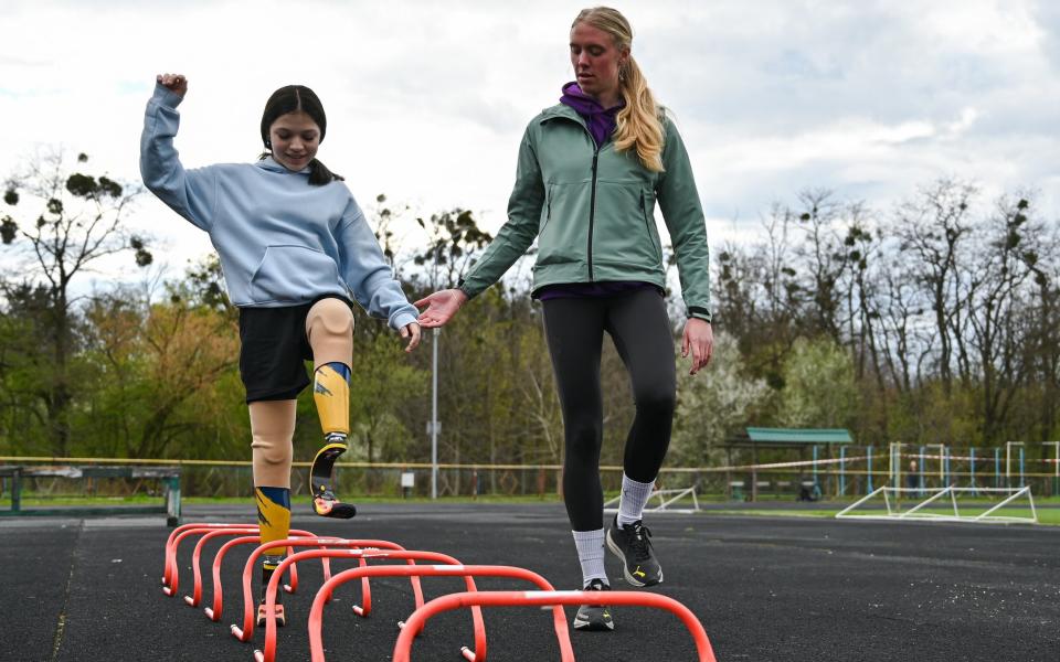 She is now preparing to run the Boston Marathon 5K on prosthetic legs