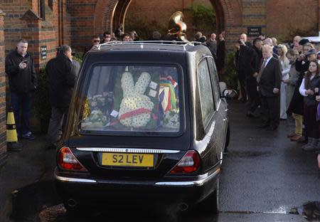 The funeral cortege of Ronnie Biggs arrives at Golders Green Crematoriumin in north London January 3, 2014. REUTERS/Toby Melville