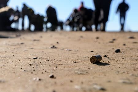 A shell casing is seen on the ground after gunfire was heard during a protest march against the Dakota Access pipeline near the Standing Rock Indian Reservation in Mandan, North Dakota, U.S. November 12, 2016. REUTERS/Stephanie Keith