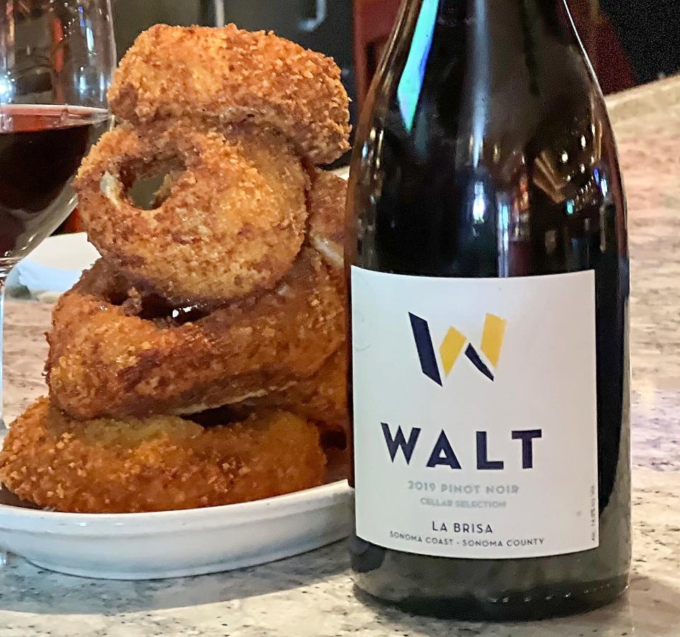 Walt La Brisa pinot noir is $23 per glass and pairs nicely with a $13 order of Fleming’s signature onion rings in Fairlawn.