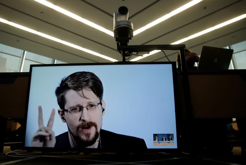 FILE PHOTO: Snowden speaks via video link as he takes part in a round table on the protection of whistleblowers at the Council of Europe in Strasbourg