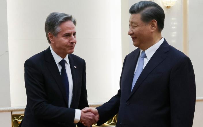 Joe Biden's remarks come a day after Antony Blinken (left) met Xi Jinping (right) in Beijing to stabilize relations