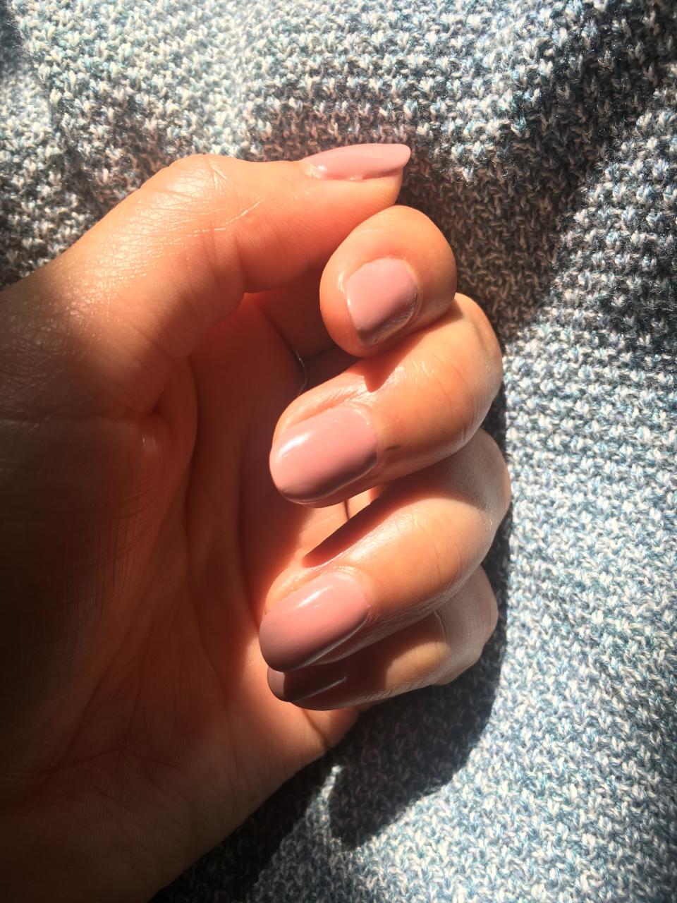 close of of pink gel manicured nails