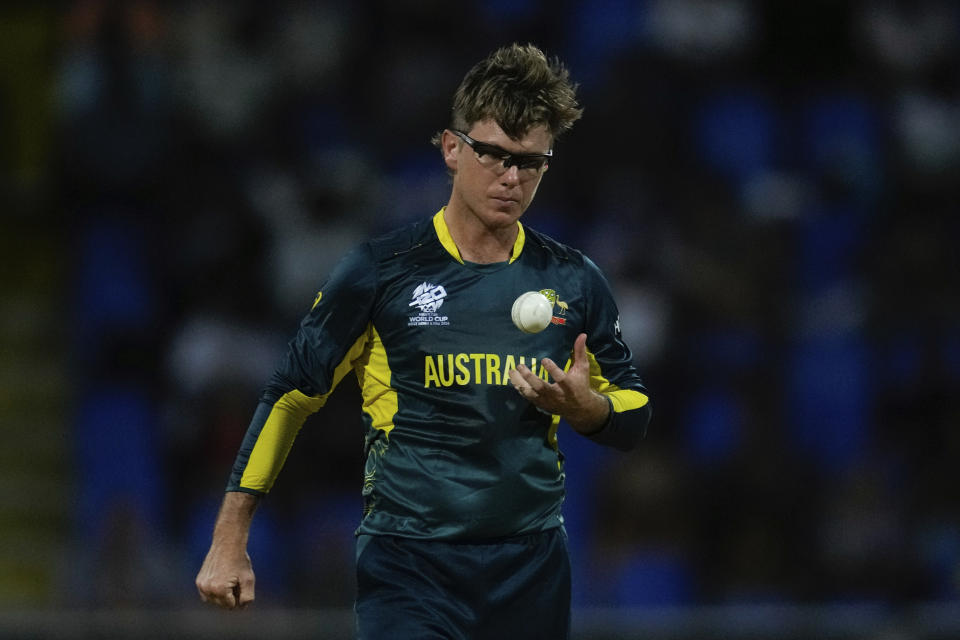 Australia's Adam Zampa tosses a ball while bowling against Namibia during an ICC Men's T20 World Cup cricket match at Sir Vivian Richards Stadium in North Sound, Antigua and Barbuda, Tuesday, June 11, 2024. (AP Photo/Ricardo Mazalan)