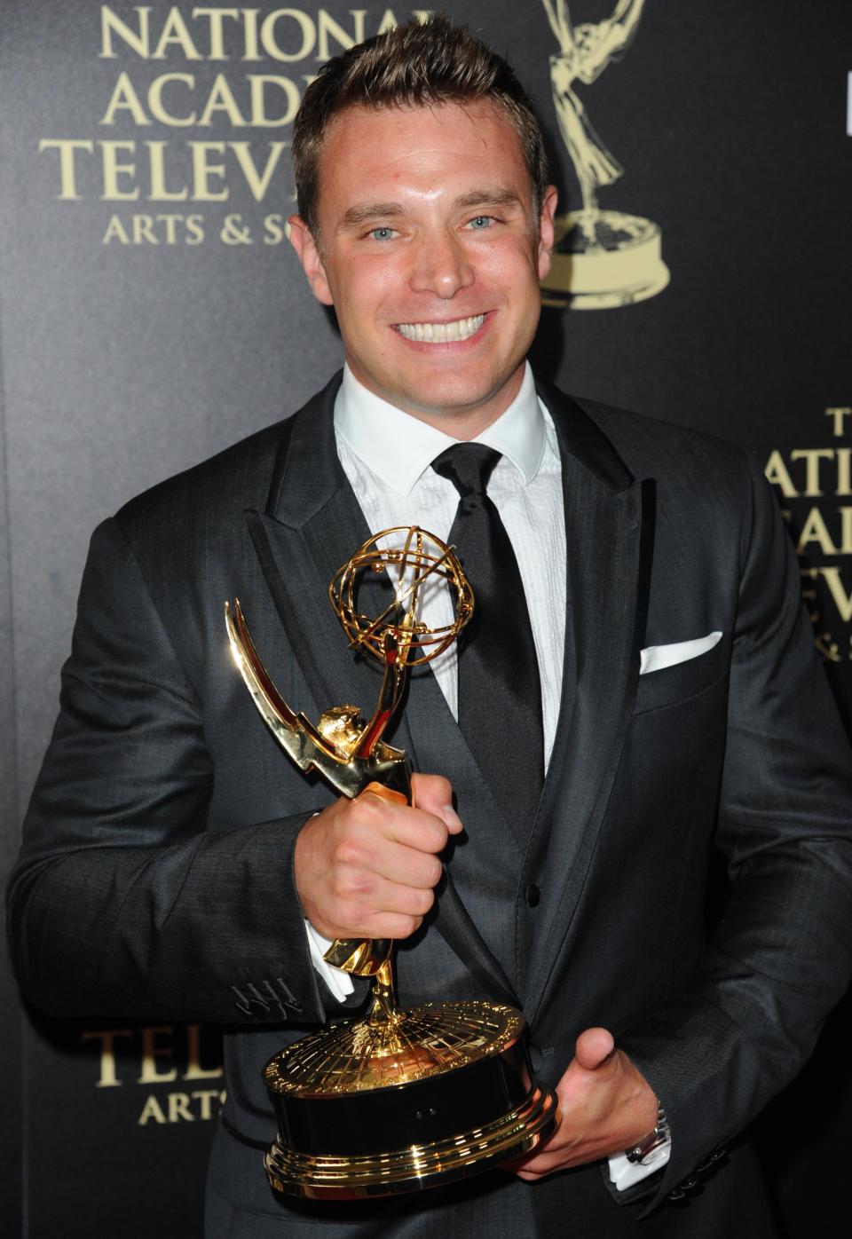 Billy Miller poses in the press room with the award for outstanding lead actor in a drama series for 