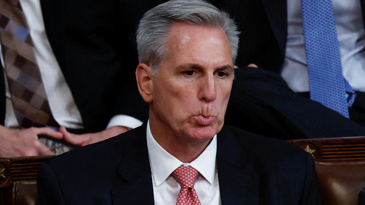 House Republican Leader Kevin McCarthy bites his lip in frustration.