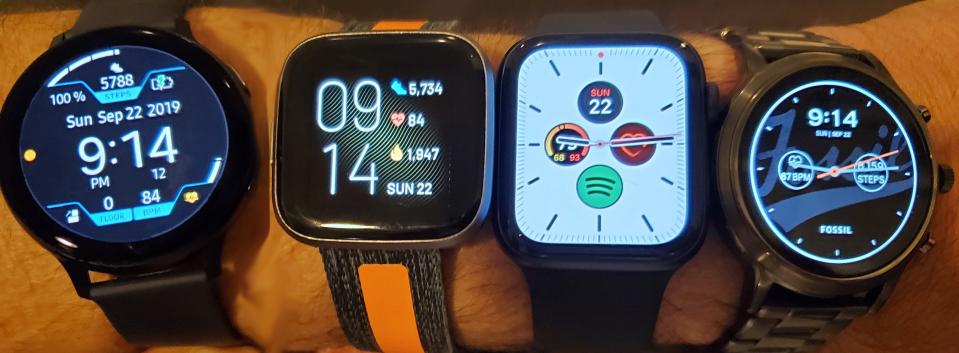 A wristful of watches, left to right: Samsung Galaxy Watch Active2, Fitbit Versa 2, Apple Watch Series 5, Fossil Gen 5.