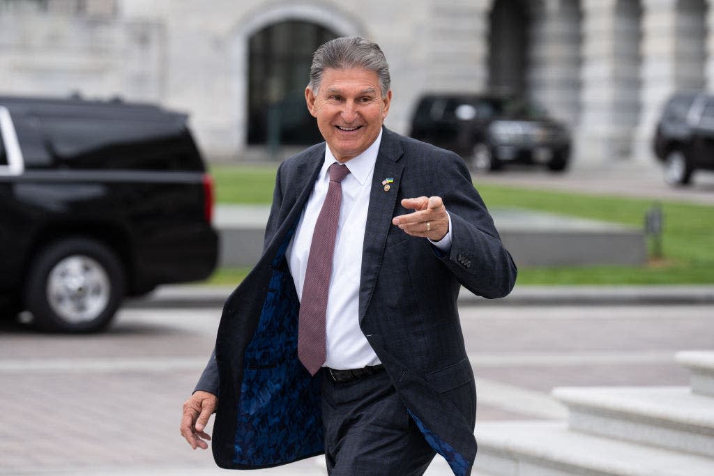 Manchin points and walks by Capitol