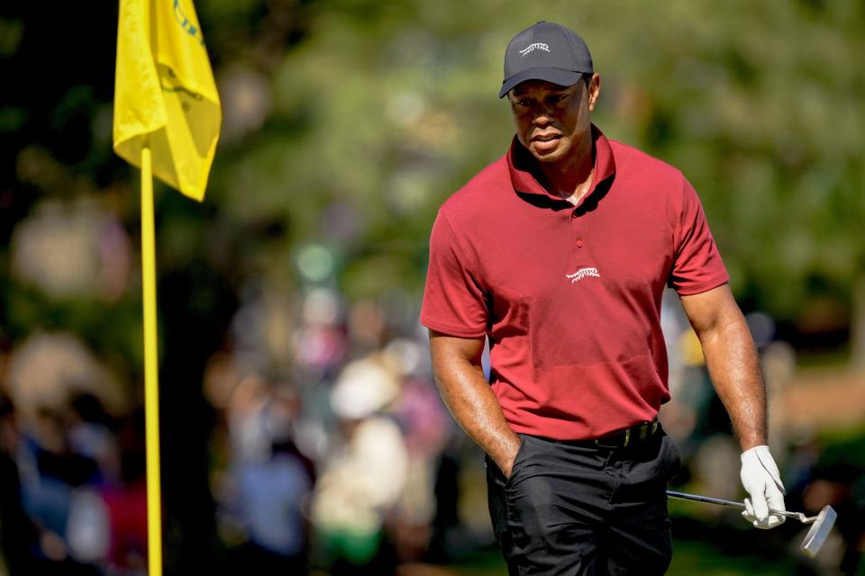 Tiger Woods walks the No. 7 green during the final round of the 2024 Masters Tournament.