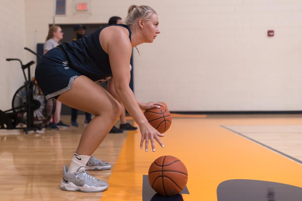 UTEP's Elina Arike (21) dribbles the ball at the women's basketball team's first practice for the 2022-23 season July 6 at the Foster & Stevens Basketball Complex at UTEP.