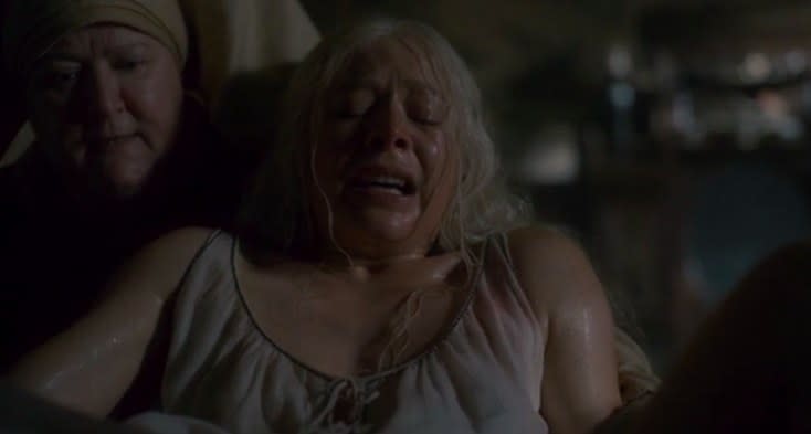 Rhaenyra grimaces in pain during childbirth