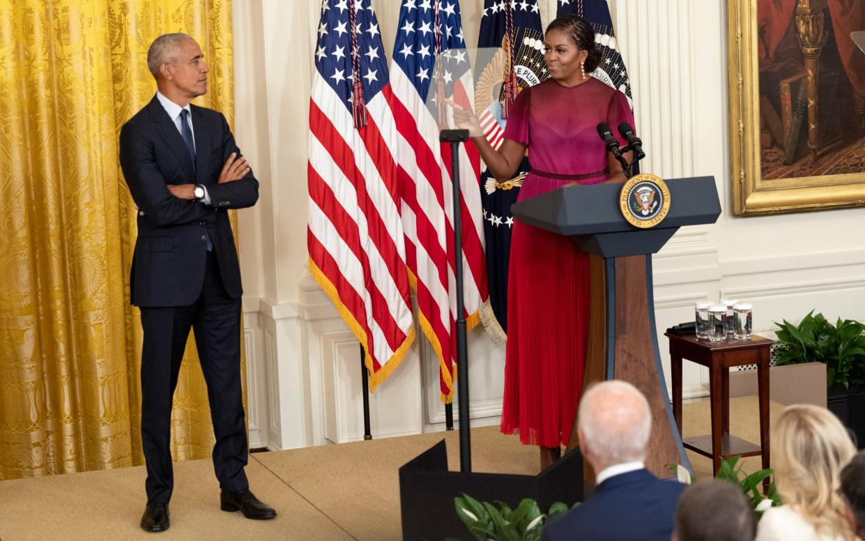 Former First Lady Michelle Obama delivers remarks alongside former U.S. President Barack Obama at a ceremony to unveil their official White House portraits at the White House on September 7, 2022 in Washington