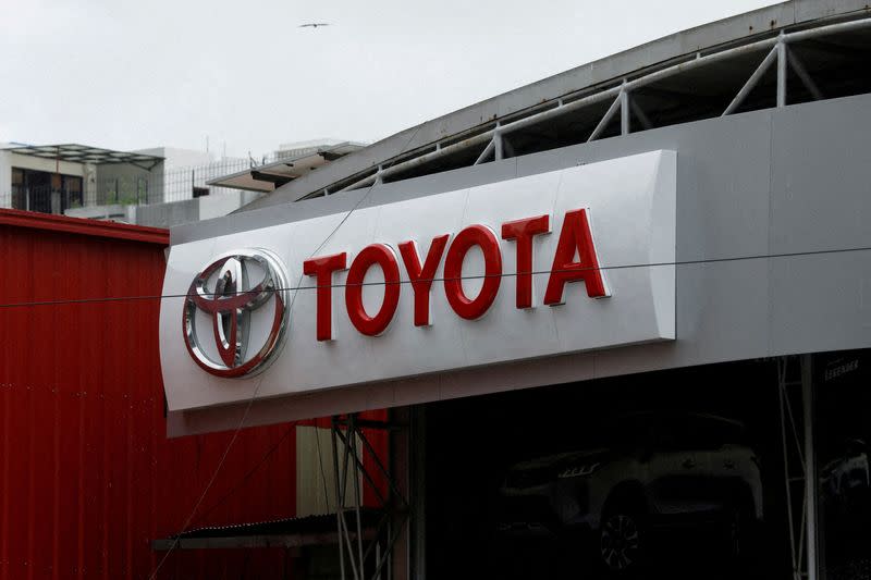 FILE PHOTO: Toyota logo is seen at a Toyota Society Motors showroom, in Karachi