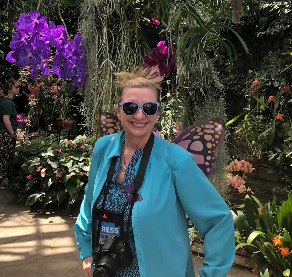 The Social Butterfly Columnist Kristi K. Higgins poses for a photo inside the Conservatory at Lewis Ginter Botanical Garden in Henrico on April 17, 2022. Also pictured is Jenna Higgins.